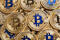 Many golden bitcoins, closeup