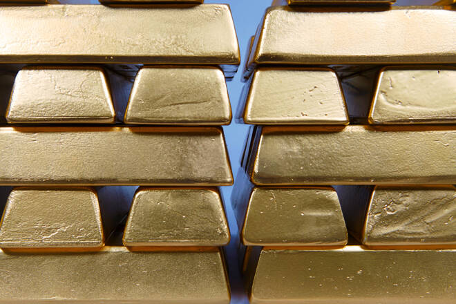 Gold Prices Fall as the Fed Points to Rate Hikes