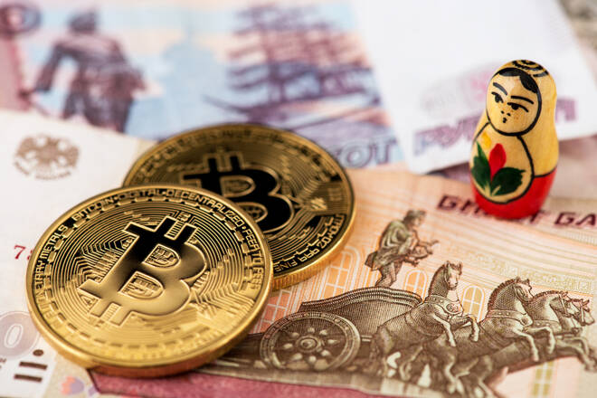 Bitcoin,Coins,On,Russian,Banknotes,With,Russian,National,Doll,A