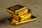 Gold,Bullion.,A,Stack,Of,Gold,Bars,Of,Various,Weights.
