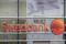 Swedbank logo is pictured on its branch in Riga