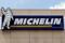 The Michelin logo with a Bibendum, the Michelin Man mascot, is pictured in front of the Michelin tyre company's headquarters in Clermont Ferrand, central France
