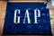 The sign for a Gap store is seen on 5th avenue in midtown Manhattan in New York