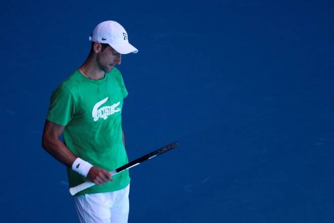 Serbian tennis player Novak Djokovic practices at Melbourne Park as questions remain over the legal battle regarding his visa to play in the Australian Open