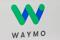 The Waymo logo is displayed during the company's unveil of a self-driving Chrysler Pacifica minivan during the North American International Auto Show in Detroit