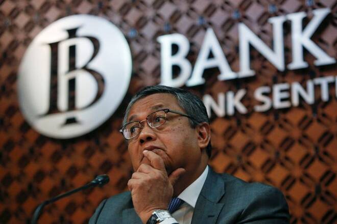 Bank Indonesia Governor Perry Warjiyo gestures during a press conference at the Bank Indonesia headquarters in Jakarta