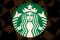 A Starbucks logo is pictured on the door of the Green Apron Delivery Service at the Empire State Building in New York