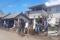 People clean debris following volcanic eruption and tsunami, in Nuku'alofa, Tonga