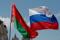 Belarusian and Russian national flags fly during "Day of multinational Russia" event in central Minsk