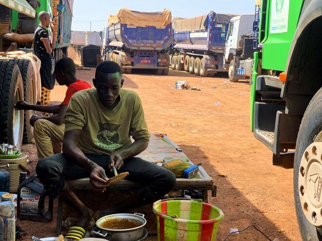 Malian trucks parked in Tingrela after the closure of the border between Ivory Coast and Mali