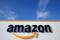 The logo of Amazon is seen at the company logistics center in Boves