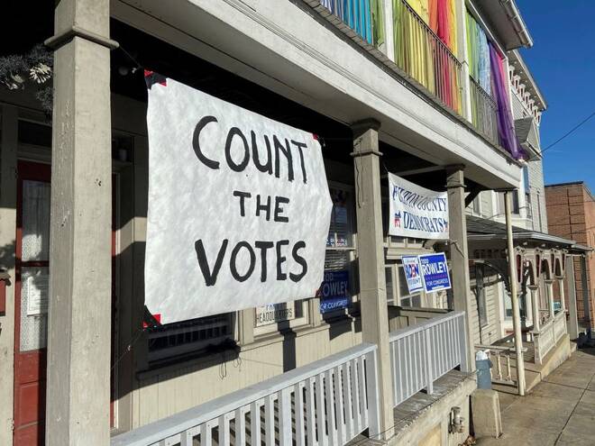 A sign urging people to vote is seen on the porch of the Democratic Party's Fulton County headquarters on Election Day in McConnellsburg, Pennsylvania