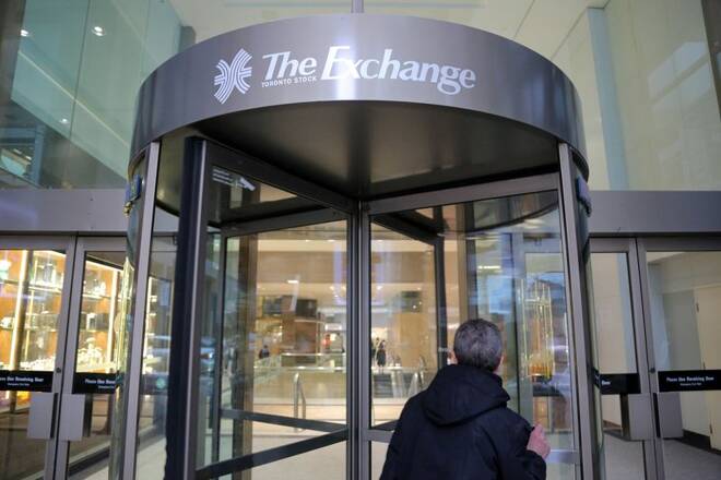 FILE PHOTO - A Toronto Stock Exchange sign adorns a doorway at the Exchange Tower building in Toronto