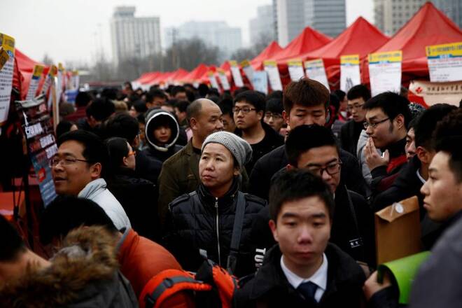 Job seekers attend an open air job in Shijiazhuang