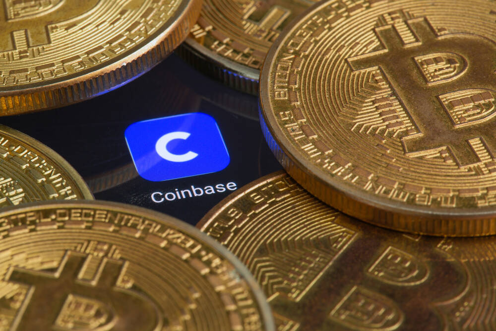 Coinbase logo and Bitcoins