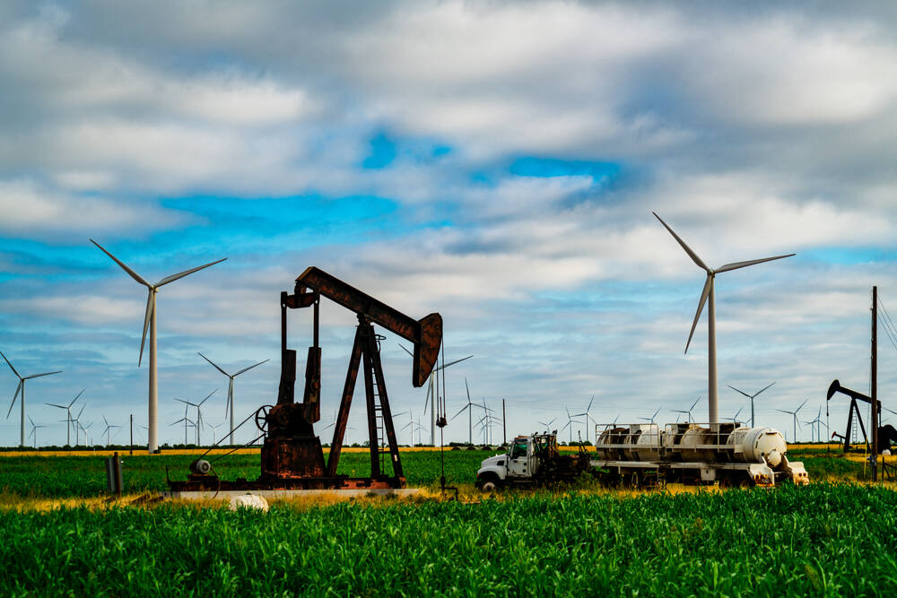Surrounded,By,Wind,Turbines,And,Oil,Pump,In,West,Texas
