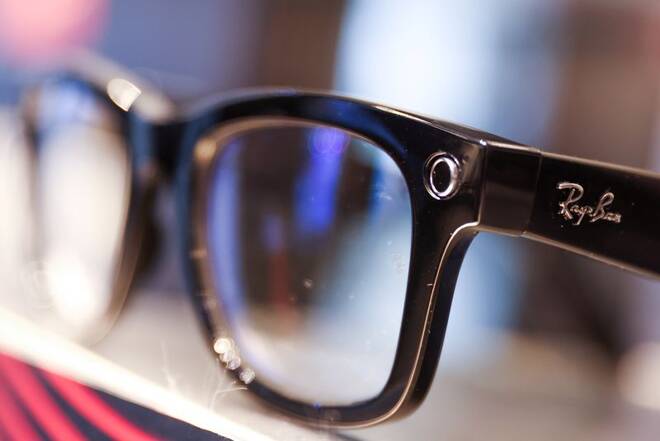 A Ray-Ban sunglass frame is pictured for sale in a Sunglass Hut, both brands owned by EssilorLuxottica SA, in Manhattan