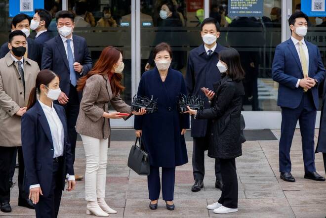 South Korea's former President Park Geun-hye speaks to reporters as she leaves the Samsung Medical Center in Seoul
