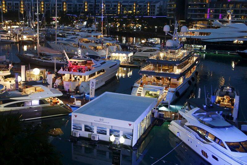 Ferretti booth sits among yachts on display at the Singapore Yacht Show on Sentosa Island