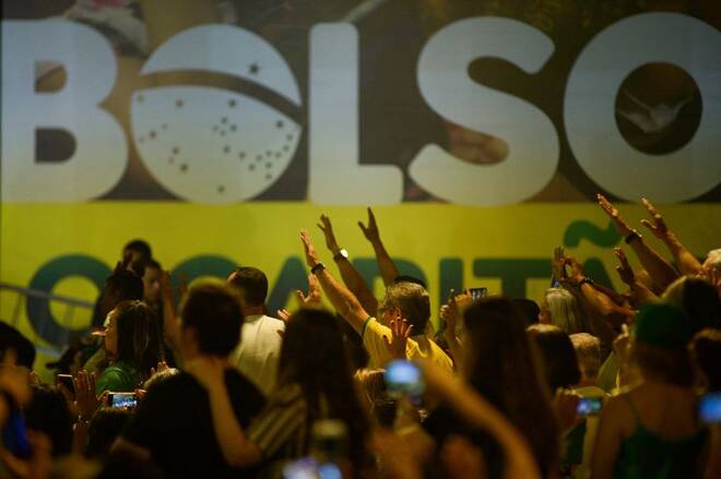 Supporters of Brazil's President Bolsonaro take part in an event as Bolsonaro presents his candidacy, in Brasilia