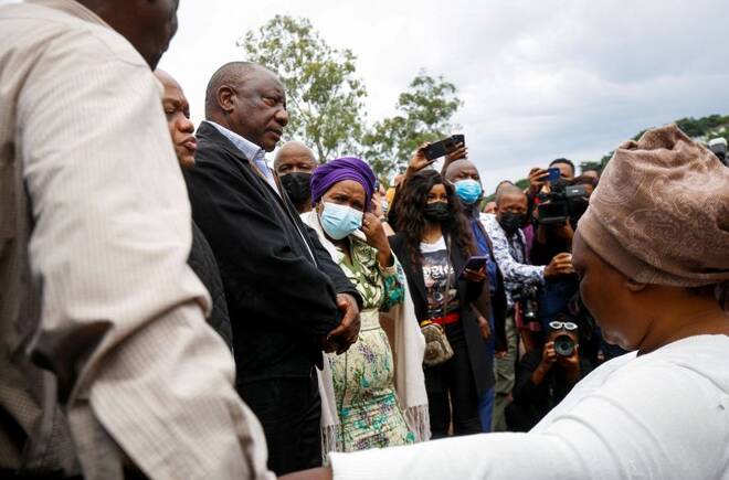 South African President Ramaphosa meets with people who lost family members during flooding in Clermont