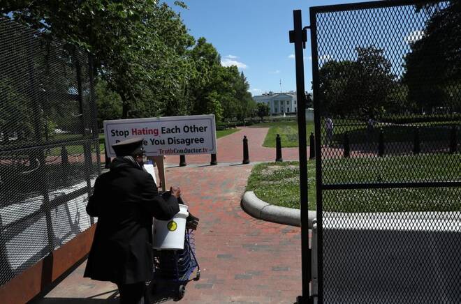 People visit Lafayette Square after it was reopened outside of the White House in Washington