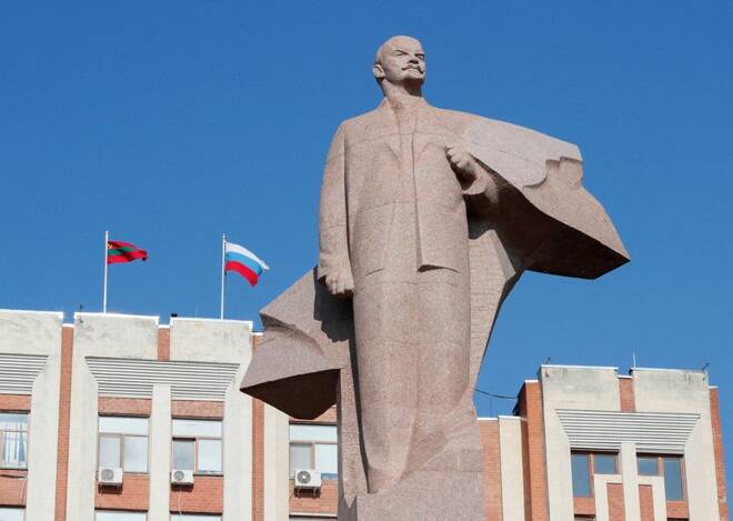 A statue of communist leader Lenin is seen in front of the parliament building in Tiraspol