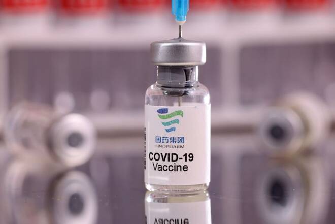 Illustration shows vial labelled "Sinopharm COVID-19 Vaccine