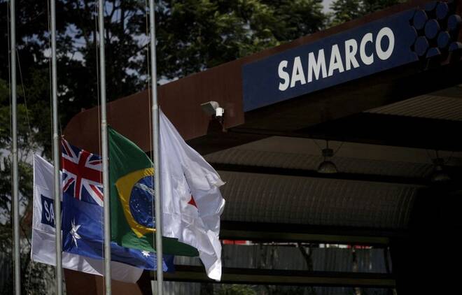 An Australian and a Brazilian flags are pictured on the entrance of the mine operator Samarco owned by Vale SA and BHP Billiton Ltd in Mariana