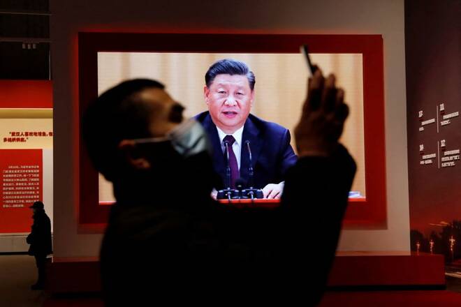 China's Xi sticks with COVID stance despite anger, economic headwinds