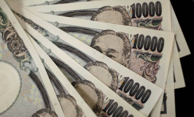 A picture illustration shows Japanese 10,000 yen notes featuring a portrait of Yukichi Fukuzawa, the founding father of modern Japan