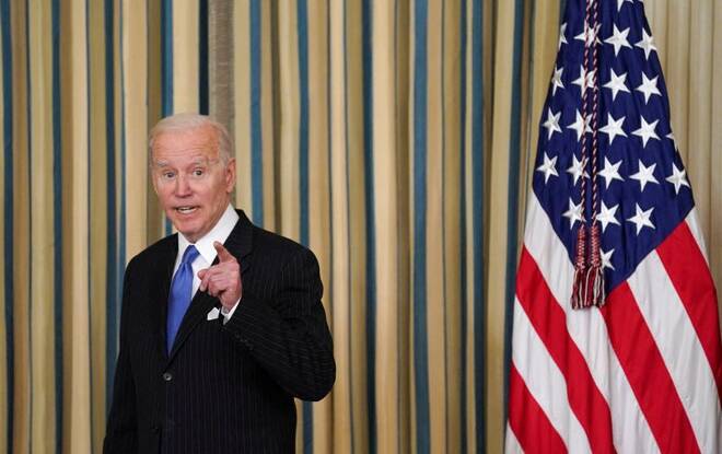 Biden signs Postal Service Reform Act in Washington