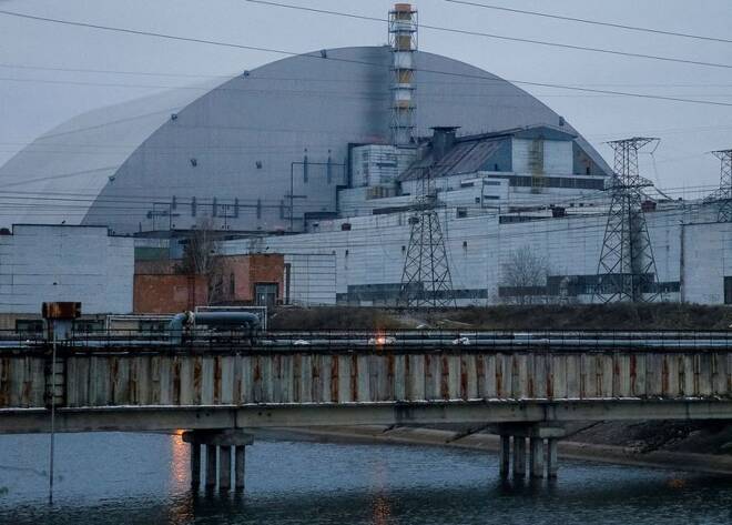 A general view shows the New Safe Confinement structure over the old sarcophagus covering the damaged fourth reactor at the Chornobyl Nuclear Power Plant, in Chornobyl