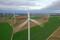 An aerial view shows power-generating windmill turbines in a wind farm in Morchies