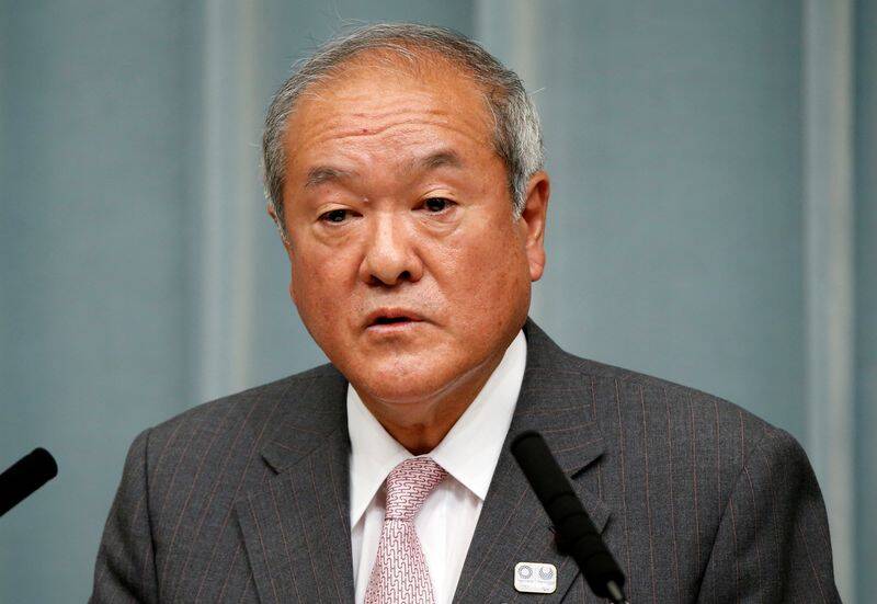 Japan's Olympics Minister Shunichi Suzuki speaks at a news conference in Tokyo