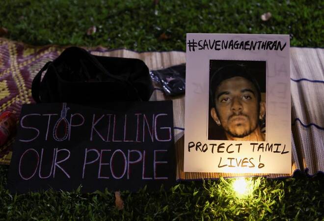 A poster of Nagaenthran Dharmalingam is pictured at a vigil ahead of the planned executions of Malaysians Dharmalingam and Datchinamurthy Kataiah at Hong Lim Park