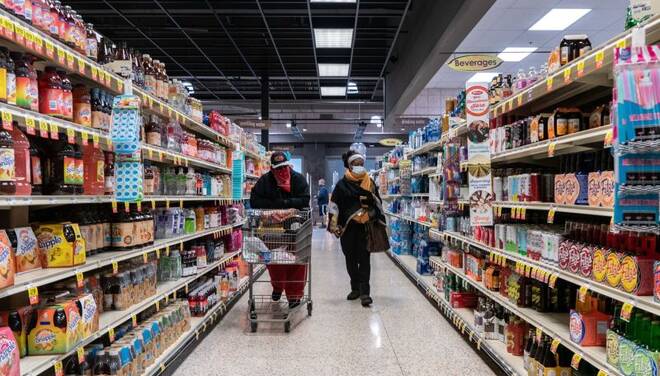 Shoppers browse in a supermarket in north St. Louis, Missouri
