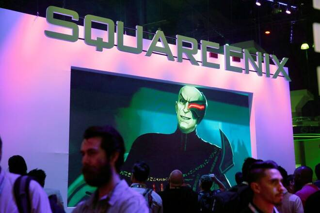 People view video screens at the Square Enix booth at the E3 Electronic Expo in Los Angeles