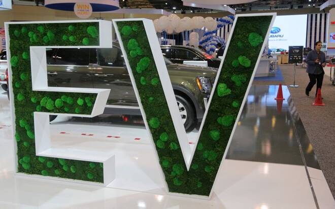 A sign promoting electric vehicles is displayed at the Canadian International AutoShow in Toronto