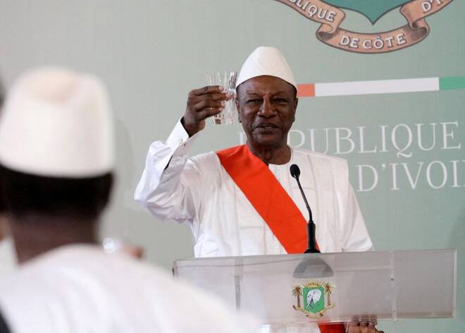 Former Guinea president Alpha Conde gives a speech at the Presidential Palace in Abidjan