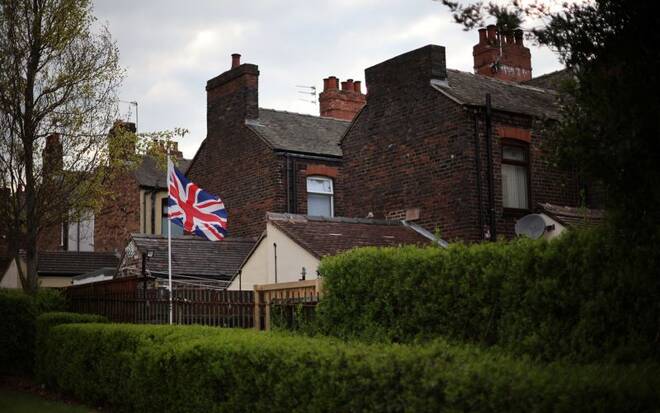 Union Jack flag flies at the garden of a terraced house in Newcastle-under-Lyme, Britain
