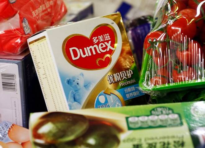 A box of Dumex milk powder product of Danone is seen in a customer's shopping cart at a supermarket in Beijing