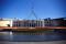 Tourists walk around the forecourt of Australia's Parliament House in Canberra