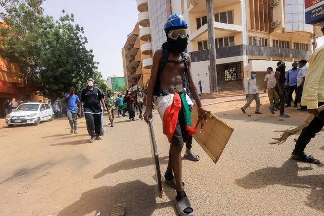 Protesters march during rally against military rule in Khartoum
