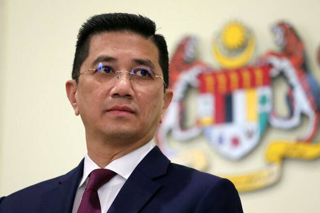 Malaysia's Minister of International Trade and Industry Azmin Ali reacts during a news conference in Putrajaya