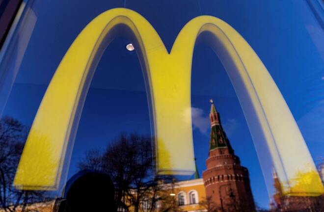 A logo of the McDonald's restaurant is seen in the window in Moscow