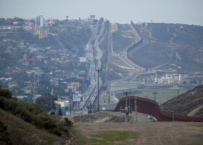 Tijuana, Mexico can be viewed on the left as assorted border walls and security between the U.S. and Mexico are shown from San Diego, California