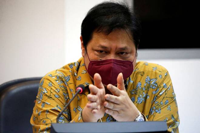 Airlangga Hartarto, Indonesia's Coordinating Minister for Economic Affairs, wearing a protective mask gestures as he talks during an interview with Reuters at the Presidential Palace in Jakarta