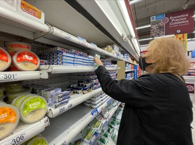 FILE PHOTO - A woman shops in a supermarket, in Buenos Aires