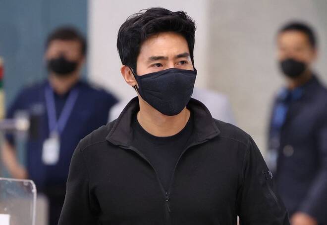 Rhee Keun, a former member of South Korean naval special forces who is also known as Ken Rhee, arrives at Incheon international airport in Incheon